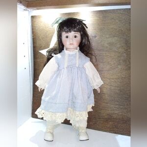 Porcelain Doll with Blue Dress and Brown Hair